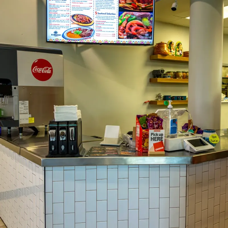 The restaurant counter and menu board